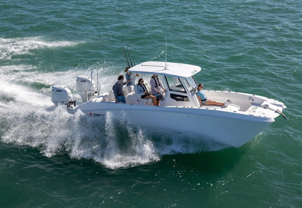 Twin Vee 280 GFX2 center console fishing boat running offshore.