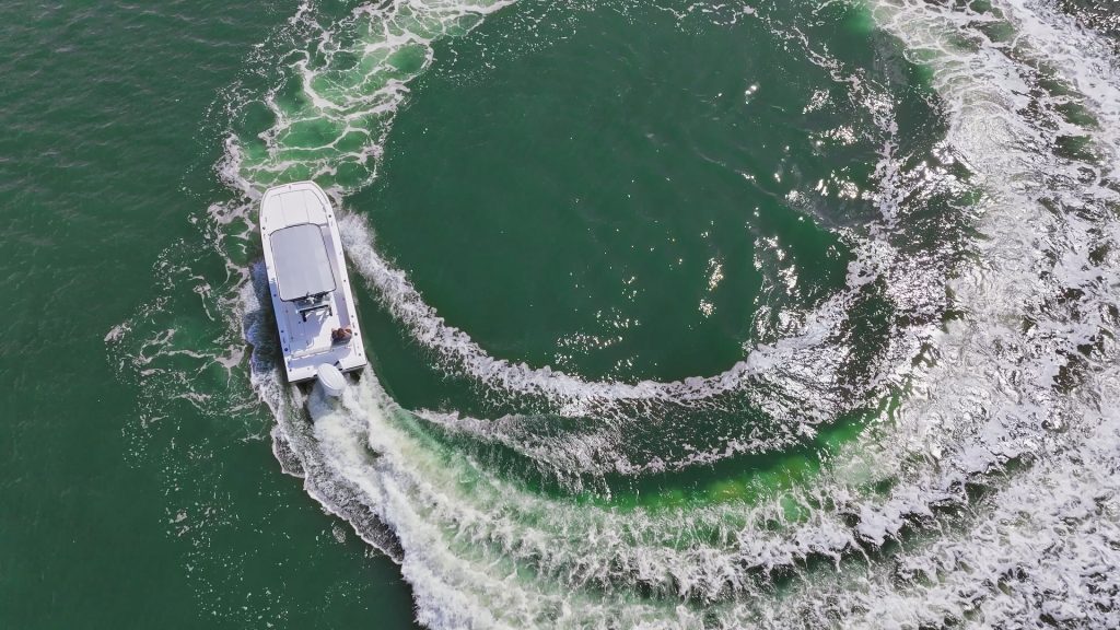Twin Vee's 22 BayCat circling in the water, overhead view.