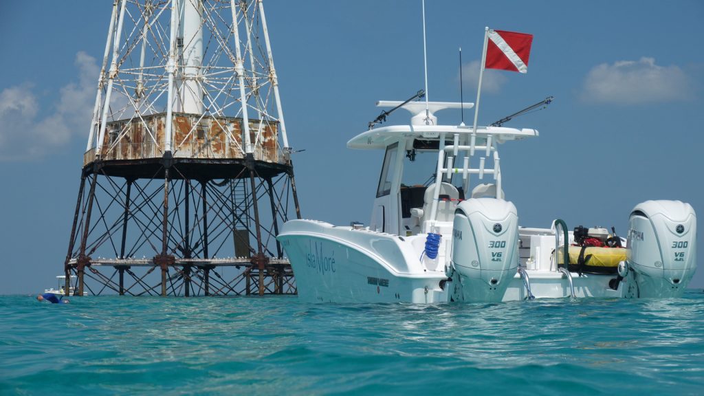Twin Vee 280 FX2 center console catamaran at Alligator Lighthouse in Islamorada, FL.