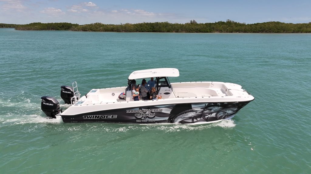 A Twin Vee 340 GFX center console with a custom wrap.
