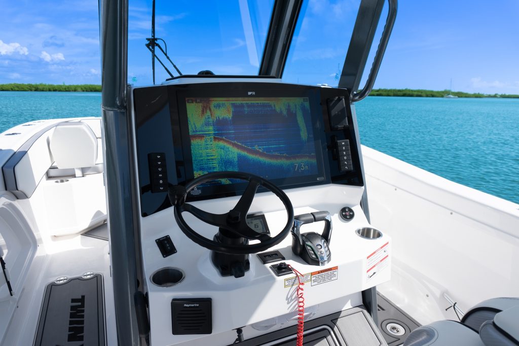 260 GFX2 helm controls with a Raymarine display.